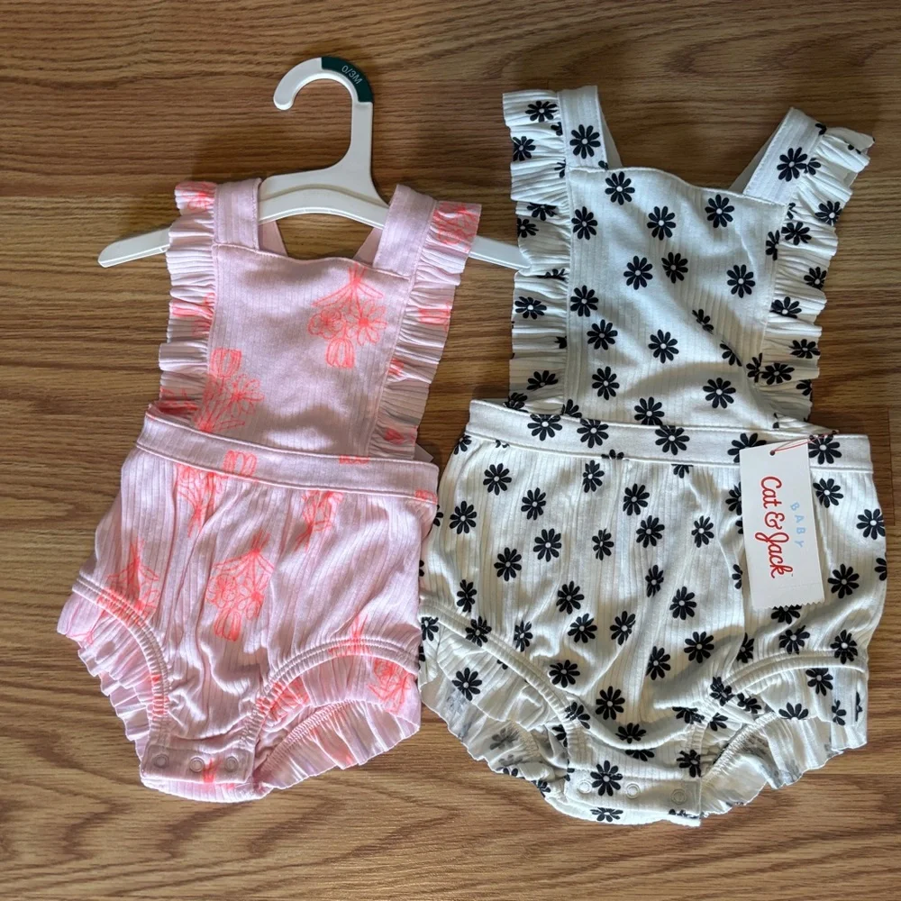 6 Cat & Jack…. 3 pink-(3 month old) 3 black and white-(12 month old)